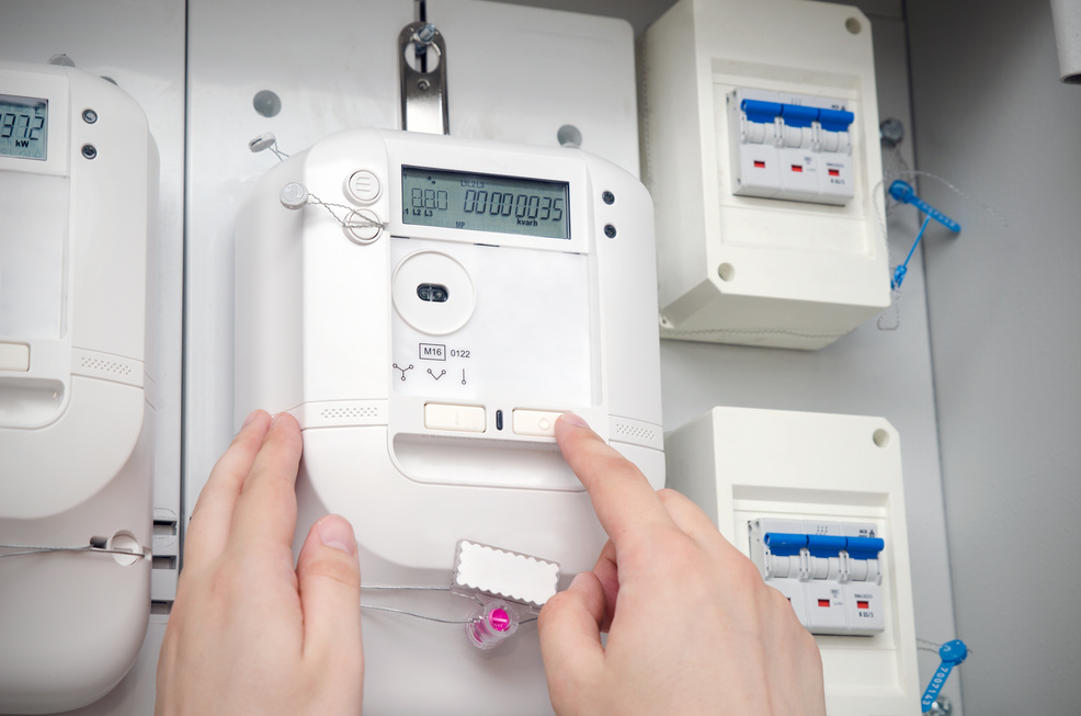 Electric Energy Meter. Electrical Technician Servicing Unit